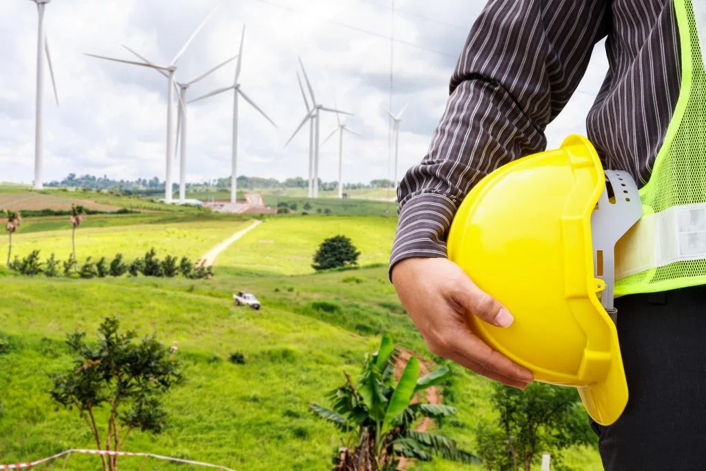 Top 6 Green Construction Techniques to Boost the Industry 2 engineer worker wind turbine power station construction site scaled